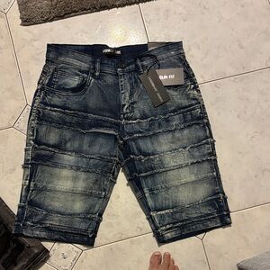 Distressed Blue Jean Shorts